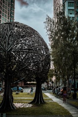 Urban steel furniture installed in a public park setting.