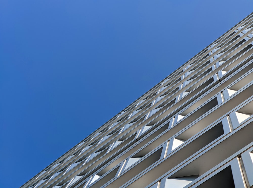 white concrete building under blue sky during daytime