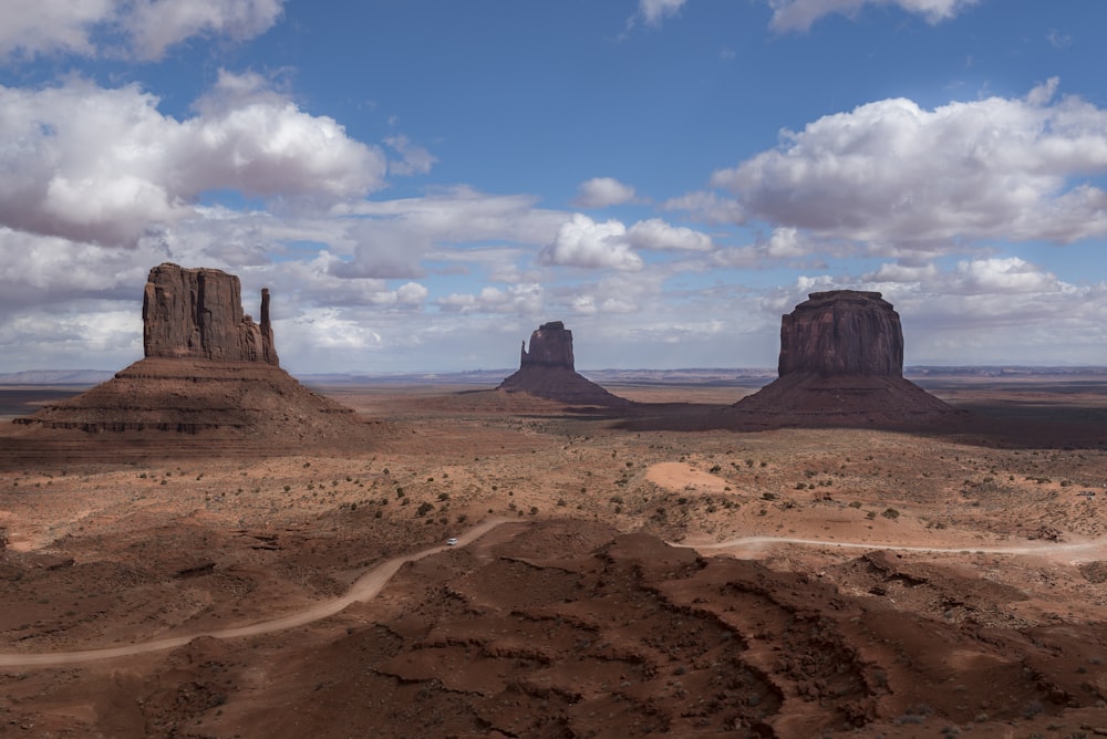 brown rock formation under blue sky during daytime