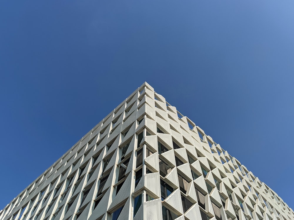 white concrete building under blue sky during daytime