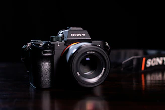 black and silver nikon dslr camera