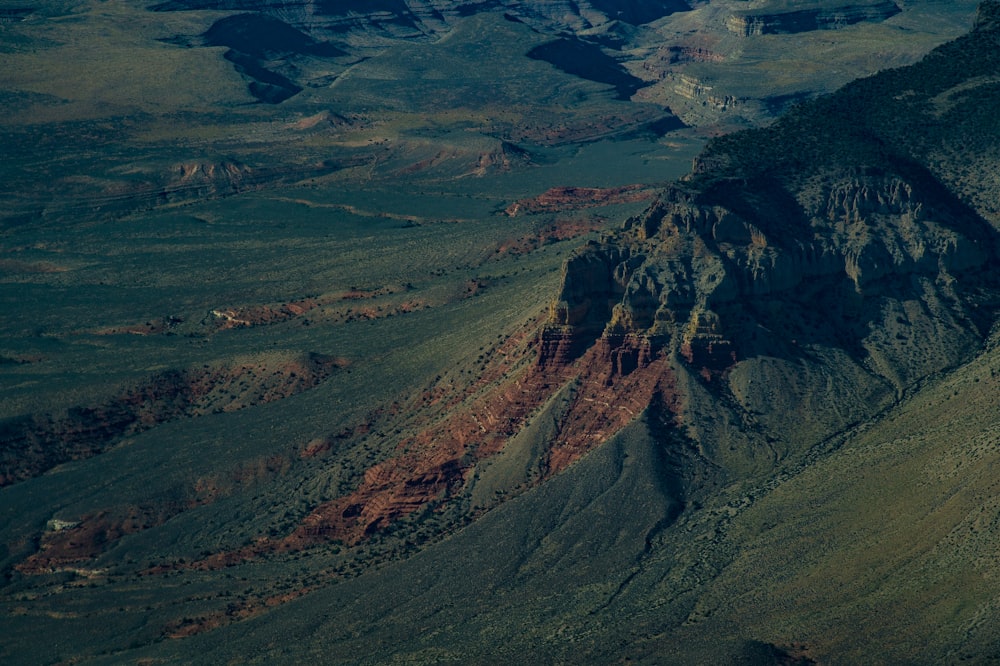 green and brown mountains under blue sky during daytime