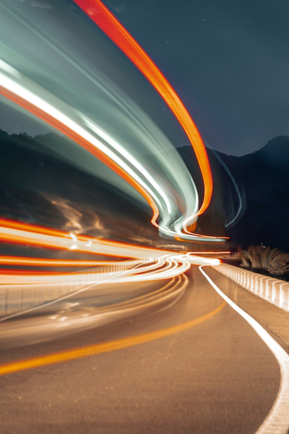 time lapse photography of cars on road during night time