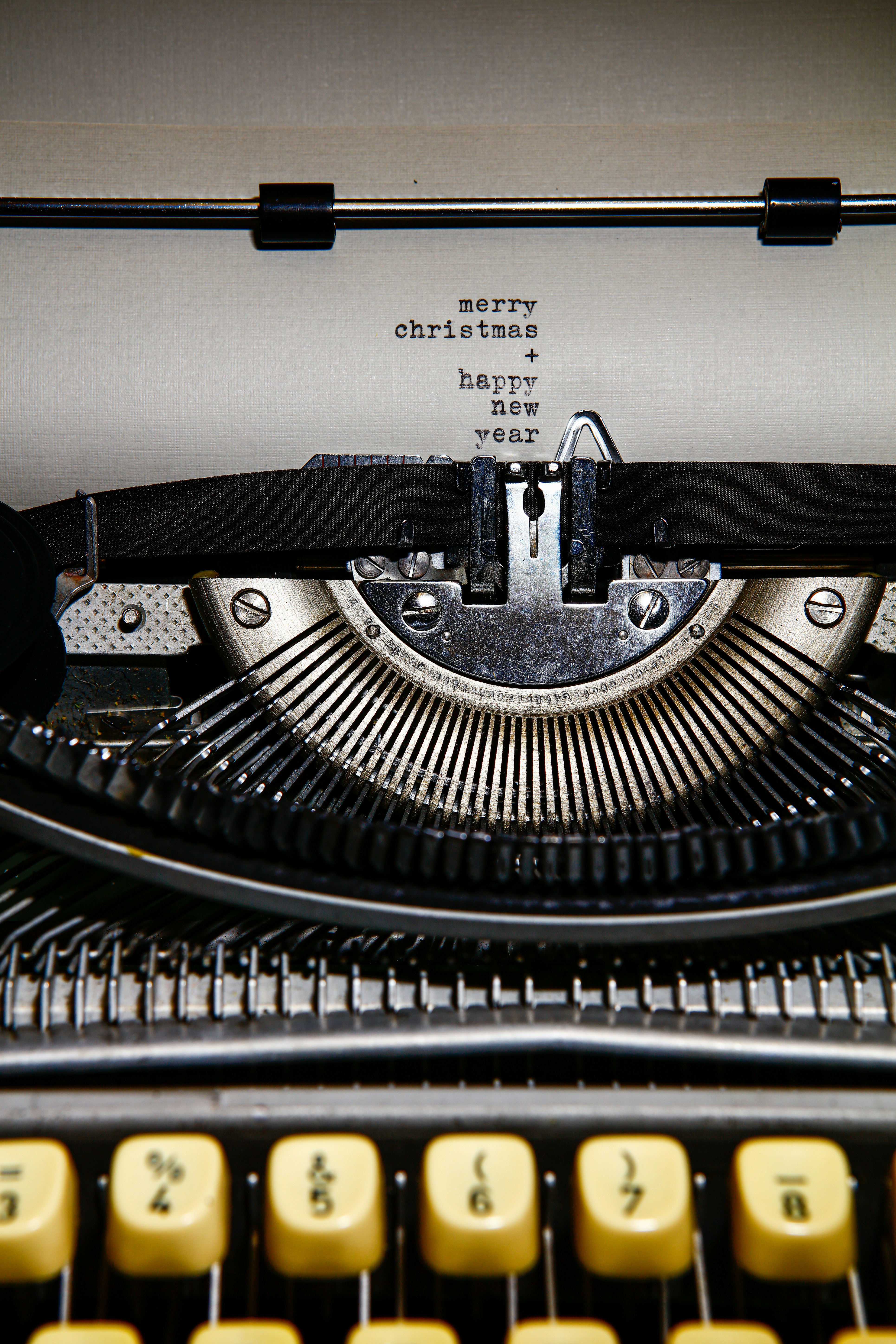 black and white typewriter on white table