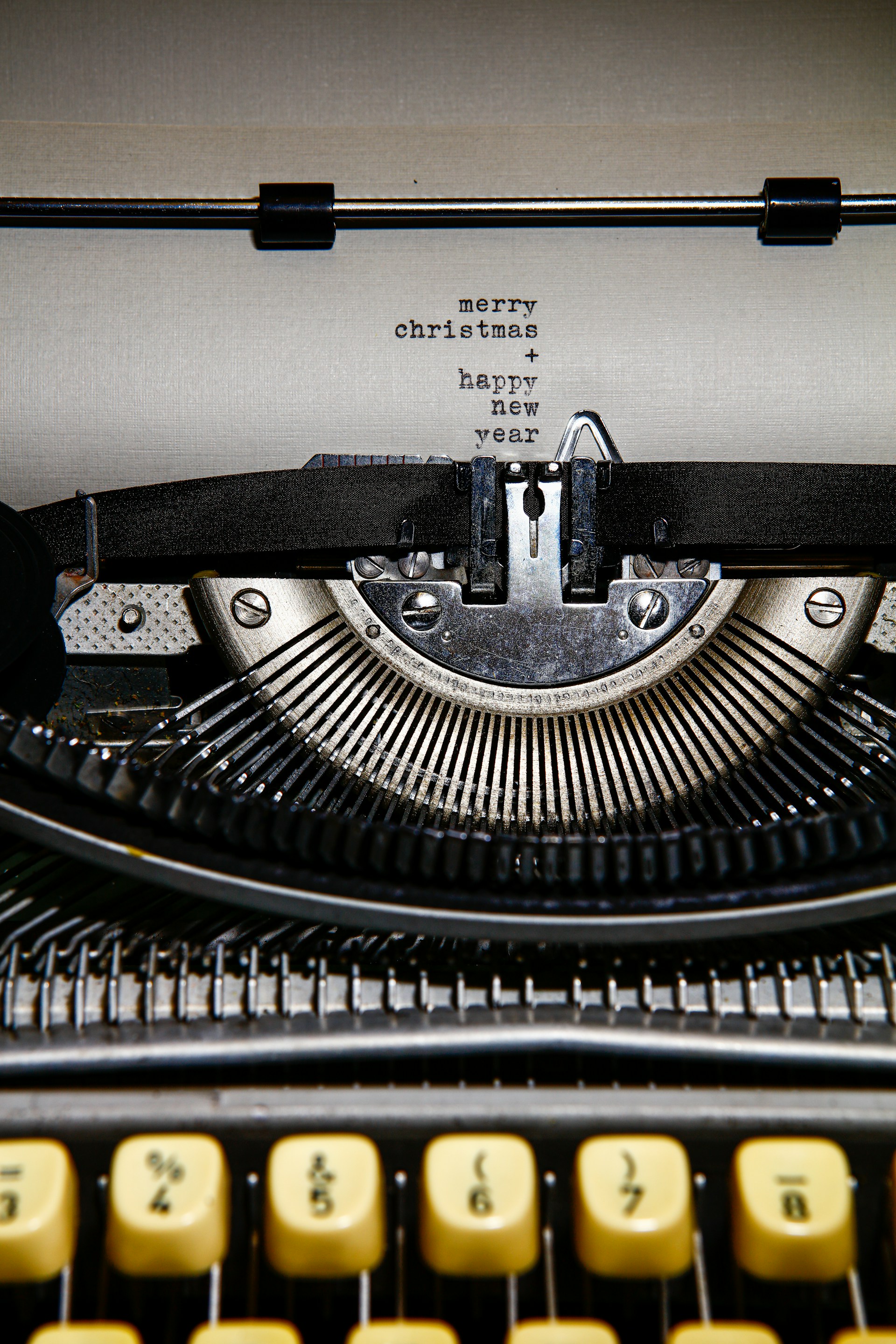 black and white typewriter on white table