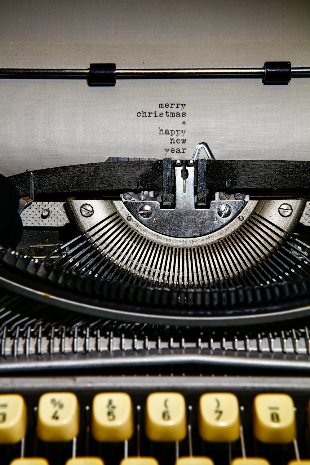 black and white typewriter on white table