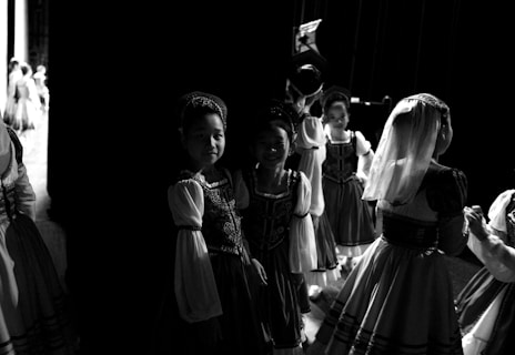 grayscale photo of woman in white dress