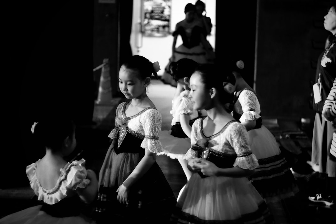 grayscale photo of girl in dress