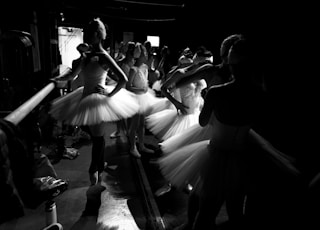 woman in white dress dancing on the street