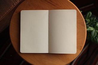 white printer paper on brown wooden table