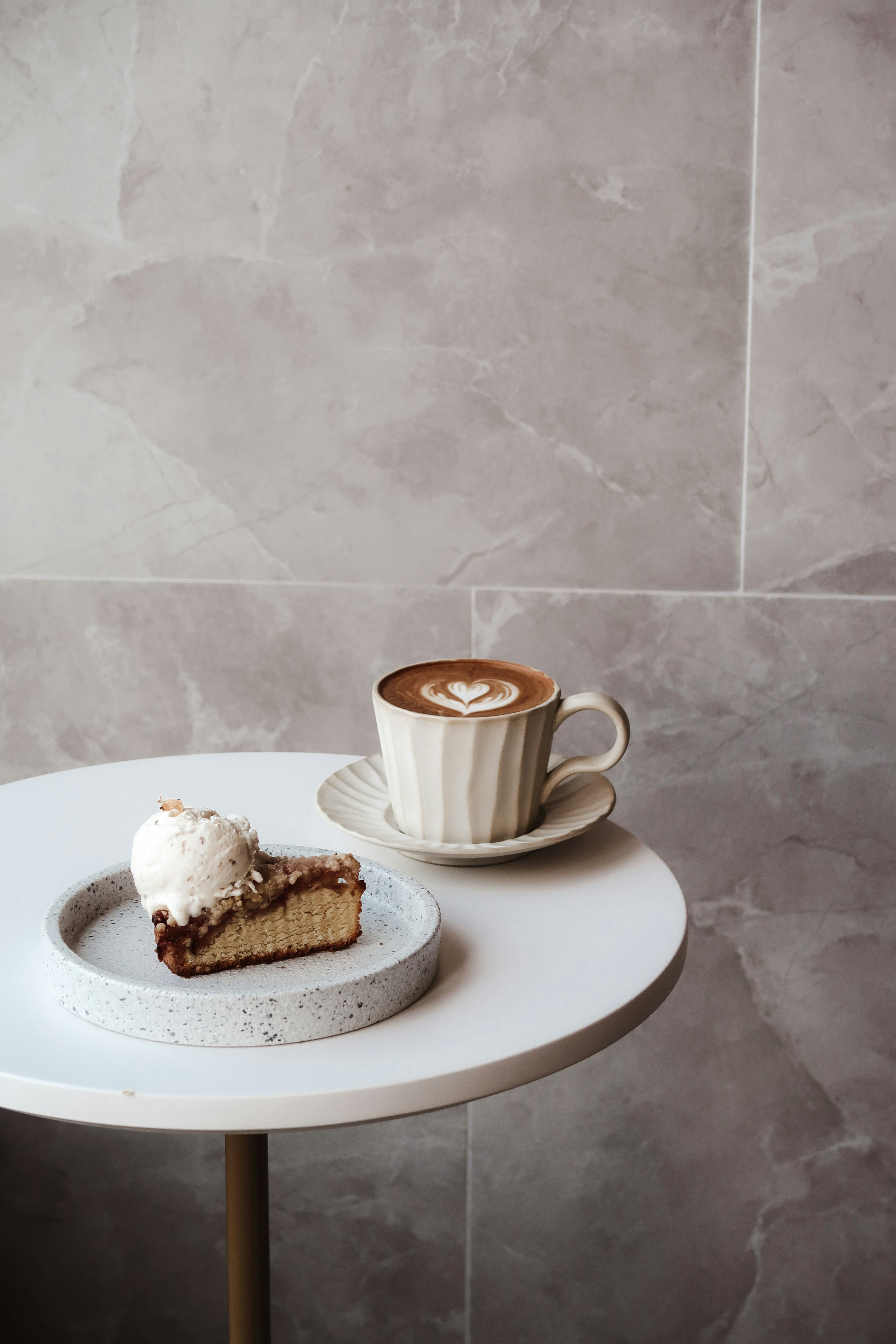 white-ceramic-mug-on-white-ceramic-plate