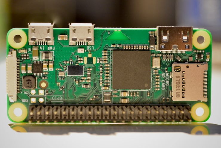 Raspberry Pi Zero W : Macro photograph of a microcomputer circuit board © Gavin Allanwood 2024 : Explore the intricate details of a microcomputer circuit board, highlighting its complex electronic pathways and components. This captivating close-up offers a glimpse into the beauty of technological innovation, showcasing the elegance of engineering through precise circuitry. A testament to modern digital craftsmanship.