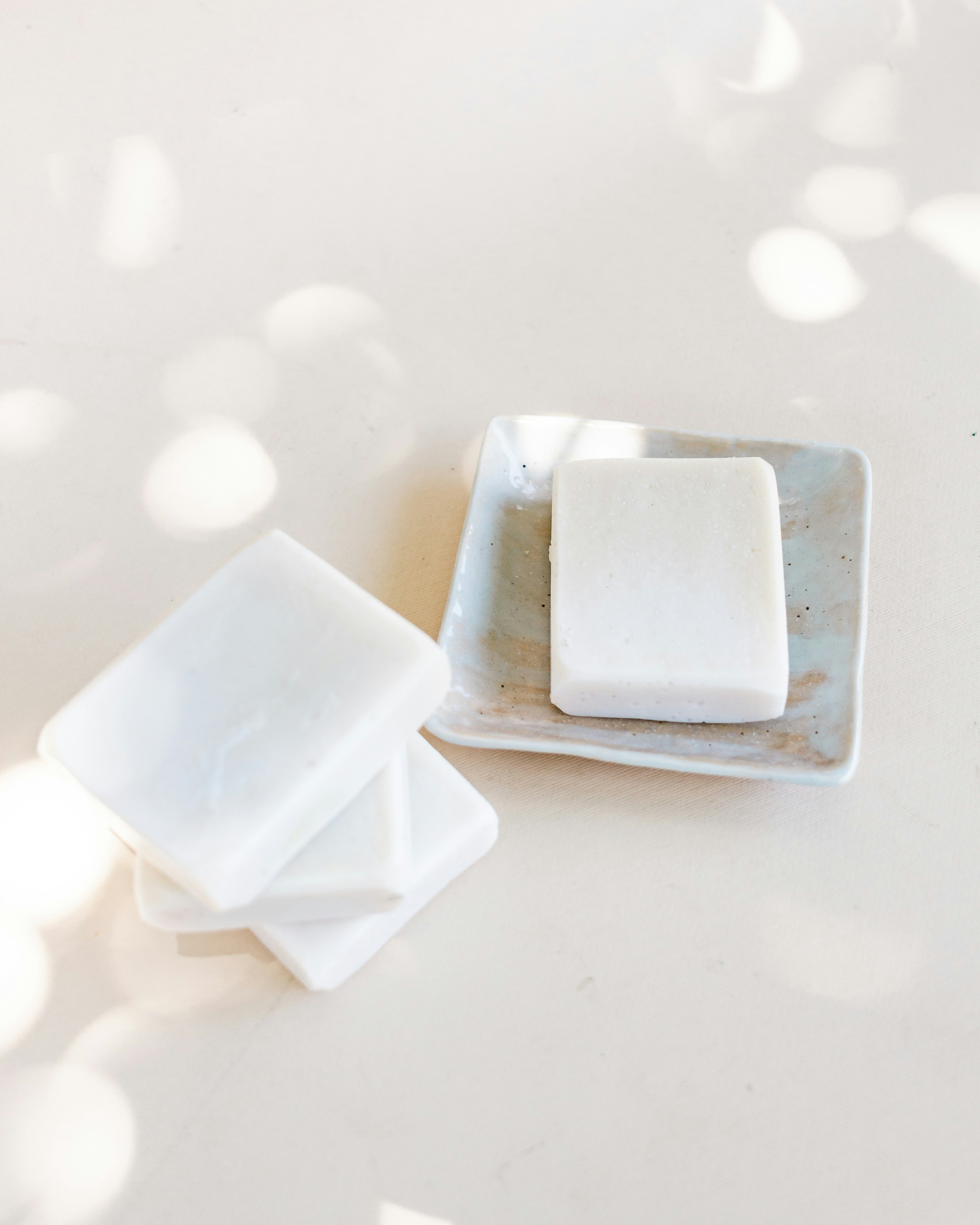 white plastic egg tray on white table