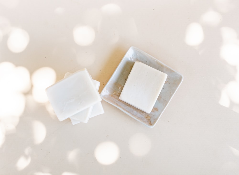 white square plastic on white surface