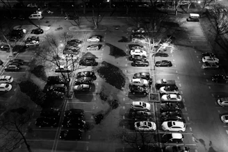 Night view of a parking lot monitored by multiple infrared cameras.