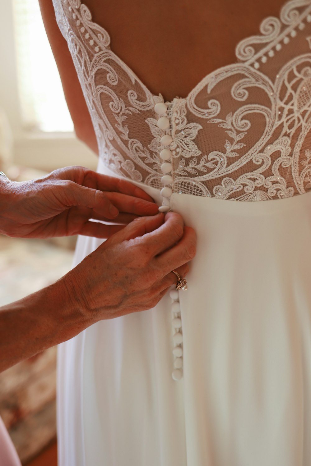 woman in white floral dress