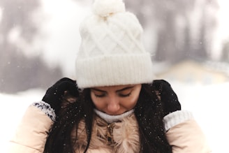 A model wearing our winter gloves while enjoying a snowy day.