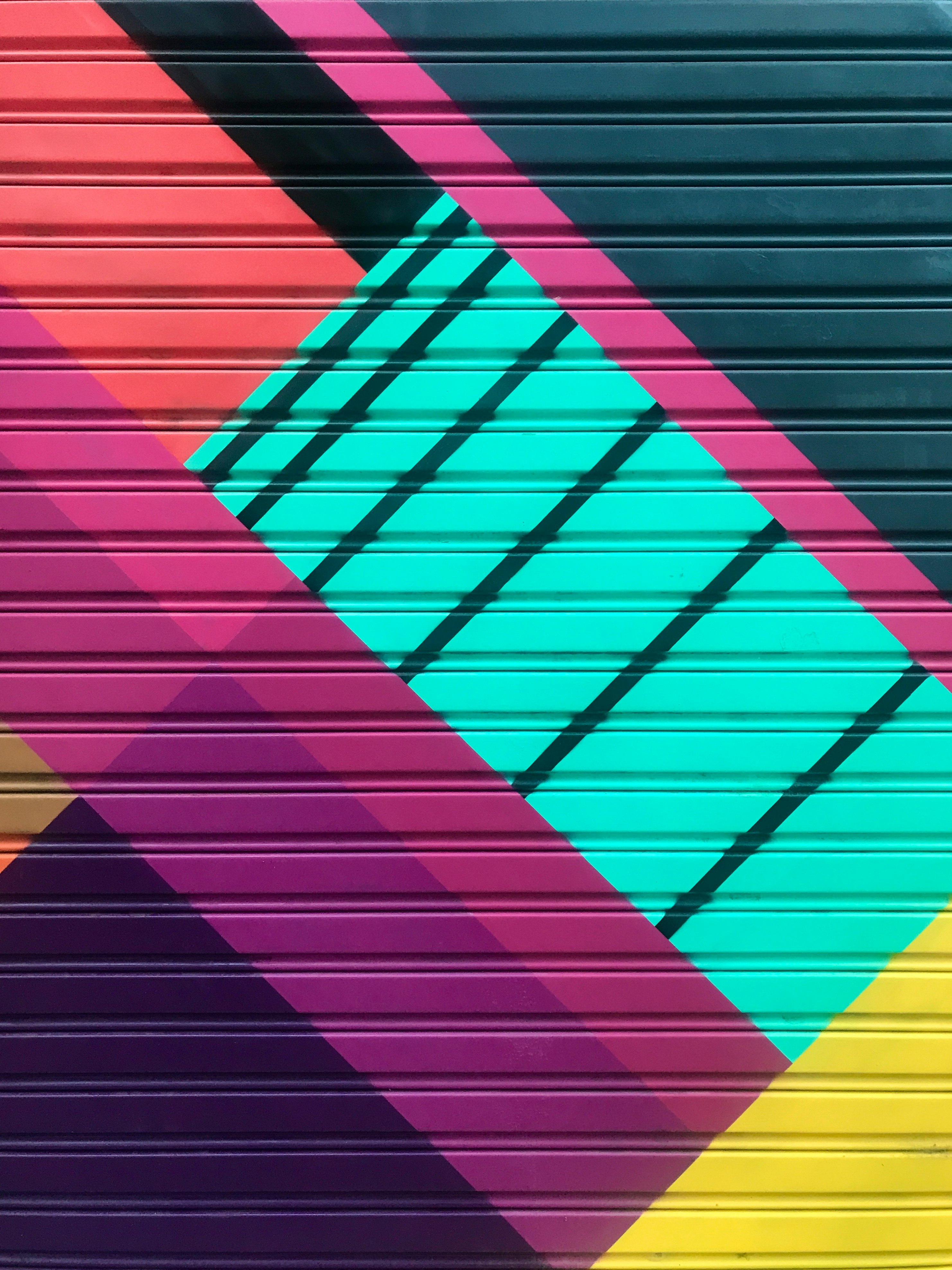red yellow and purple striped wall