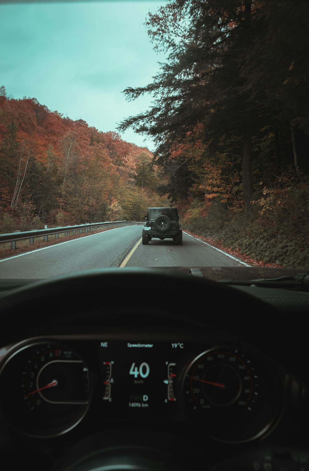 black car on road during daytime