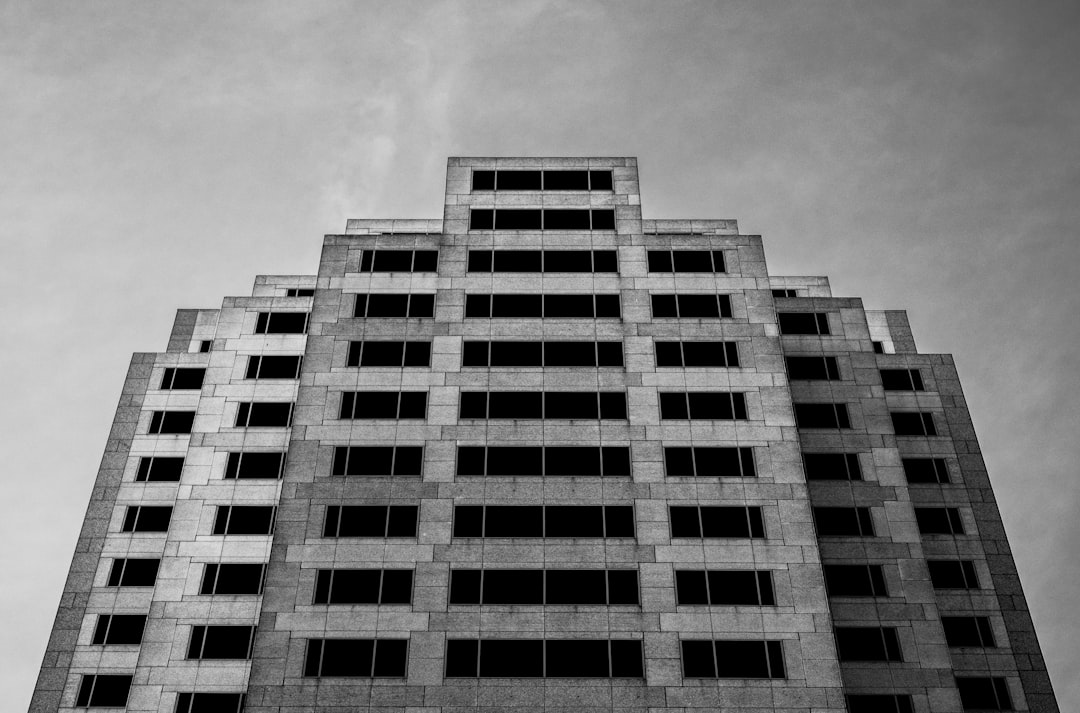 grayscale photo of concrete building