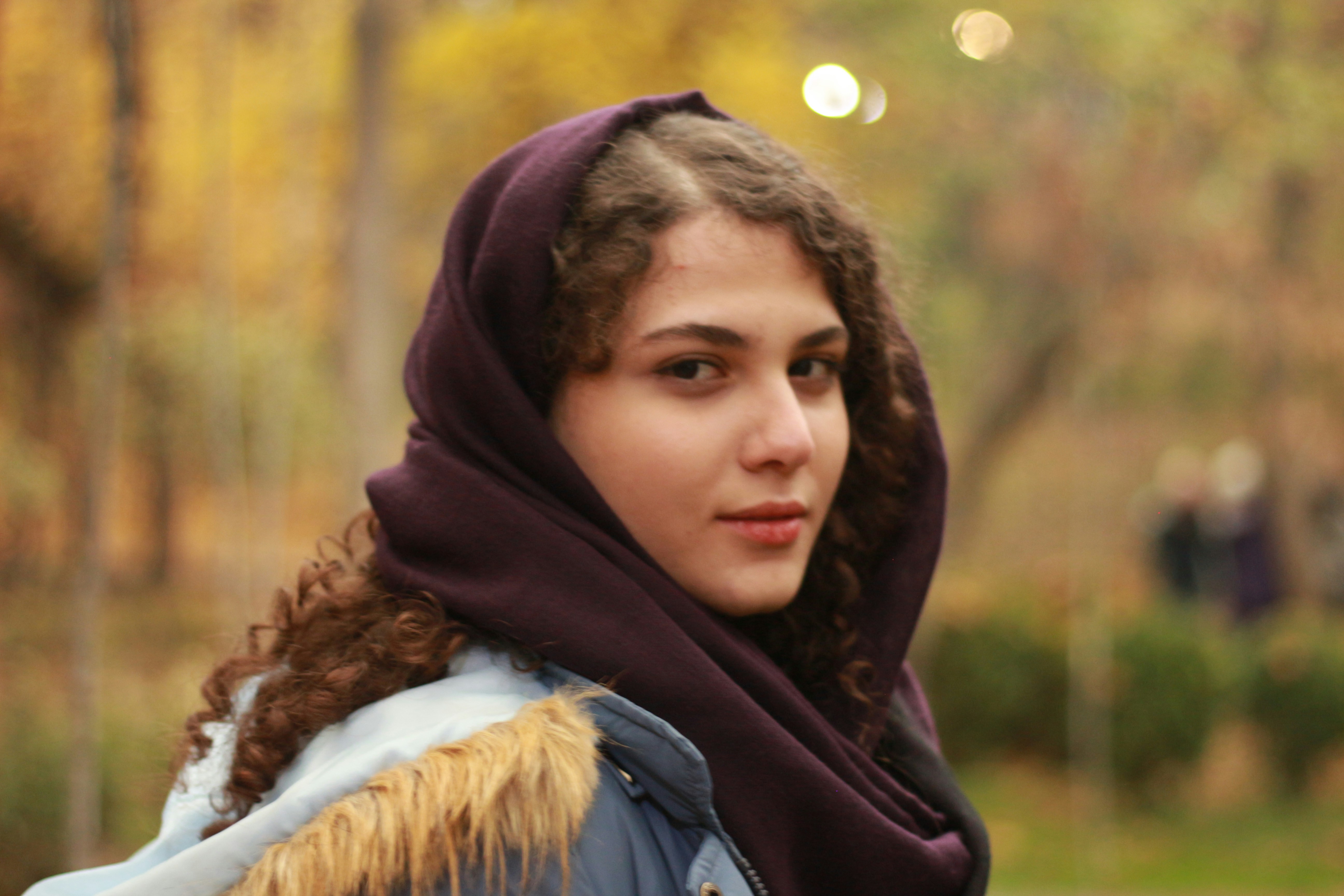 woman in black and brown hoodie