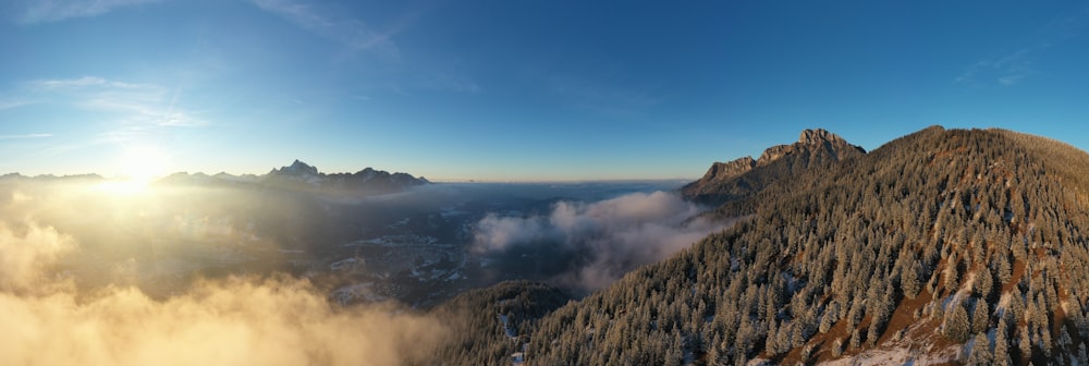 green and brown mountains under blue sky during daytime