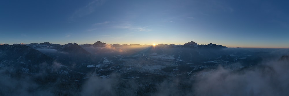 silhouette of mountains during sunset