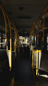 yellow and black train in train station