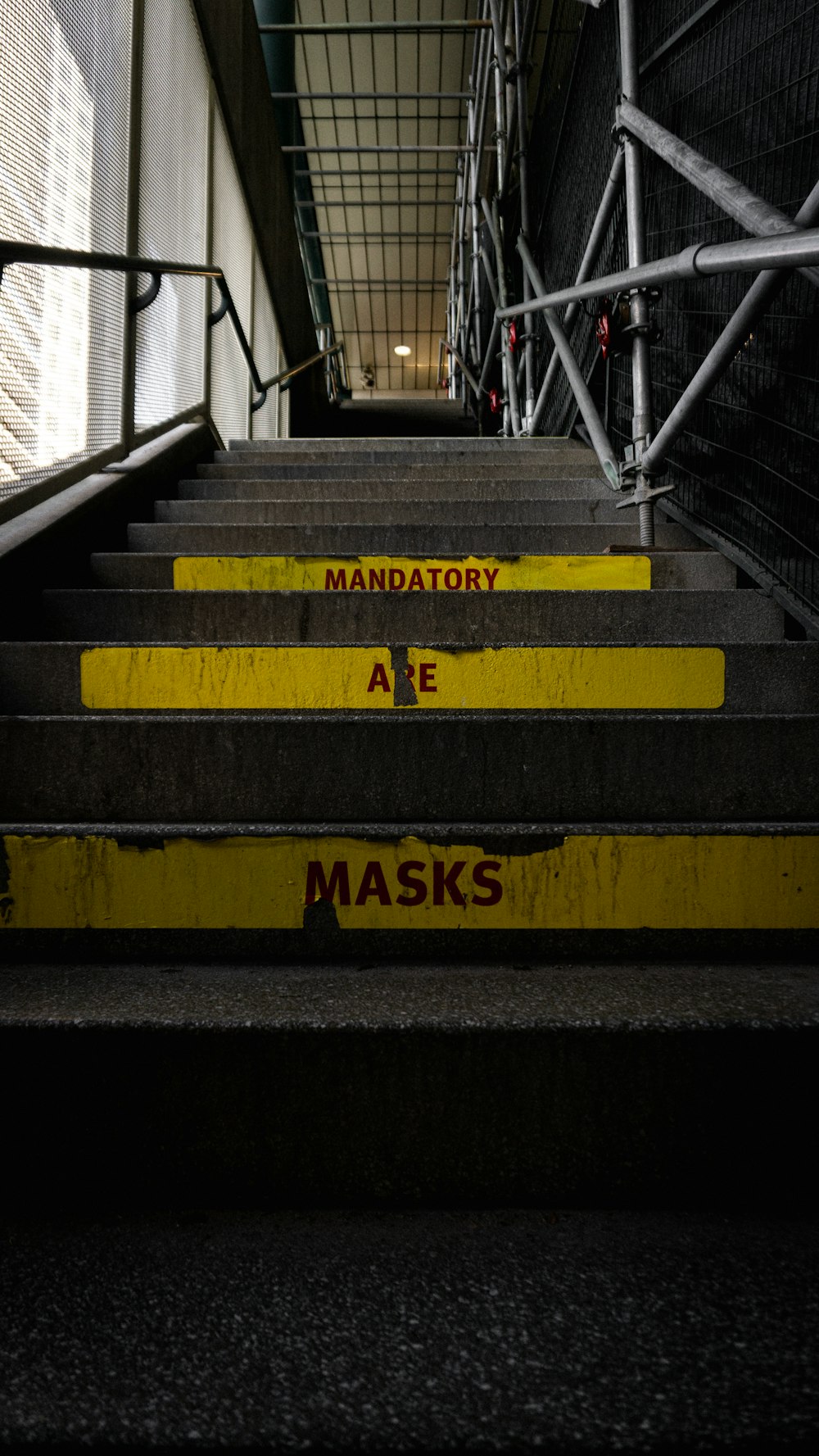 yellow and black concrete staircase