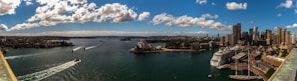 A panoramic view of a bustling port city as seen from a Viking cruise ship