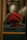 woman in red hijab sitting on brown wooden chair