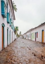 white blue and green concrete houses during daytime