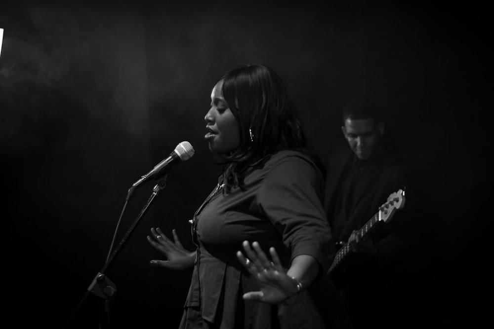 woman singing on the stage