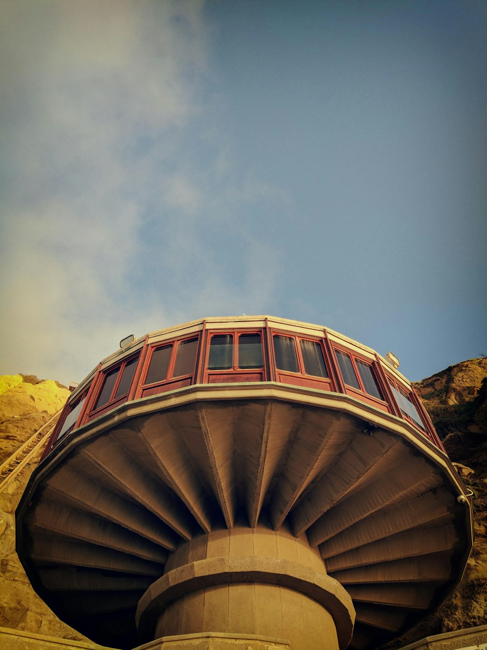 brown and white round building