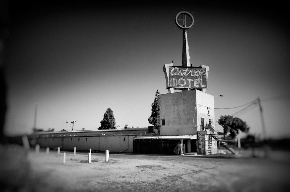 a black and white photo of a motel