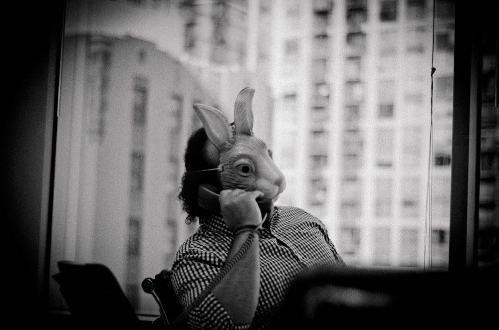 grayscale photo of rabbit plush toy