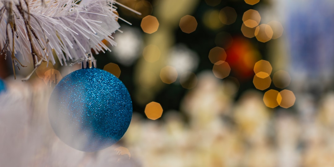 blue and white ball with bokeh lights