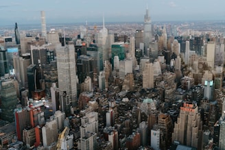 A city skyline highlighting potential site locations for business expansion.