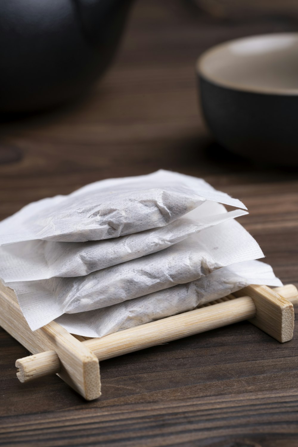 white textile on brown wooden table