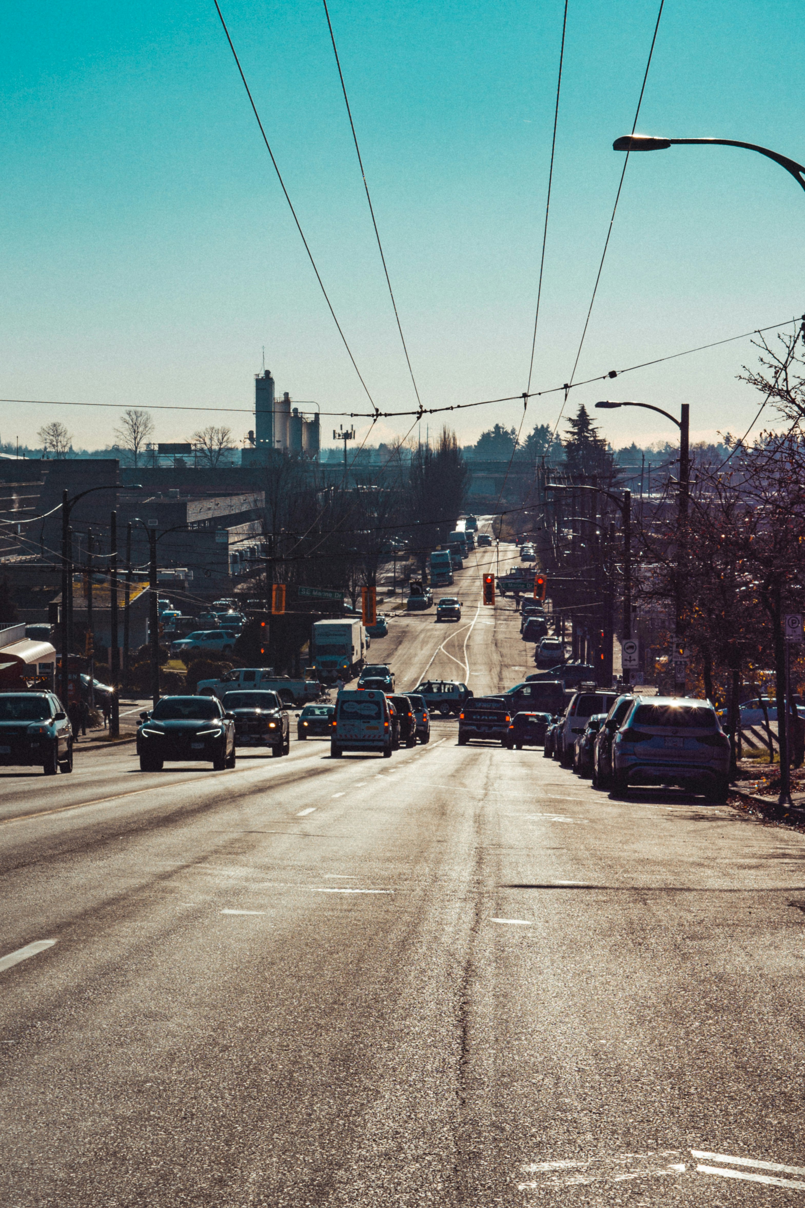 cars parked on side of the road during daytime