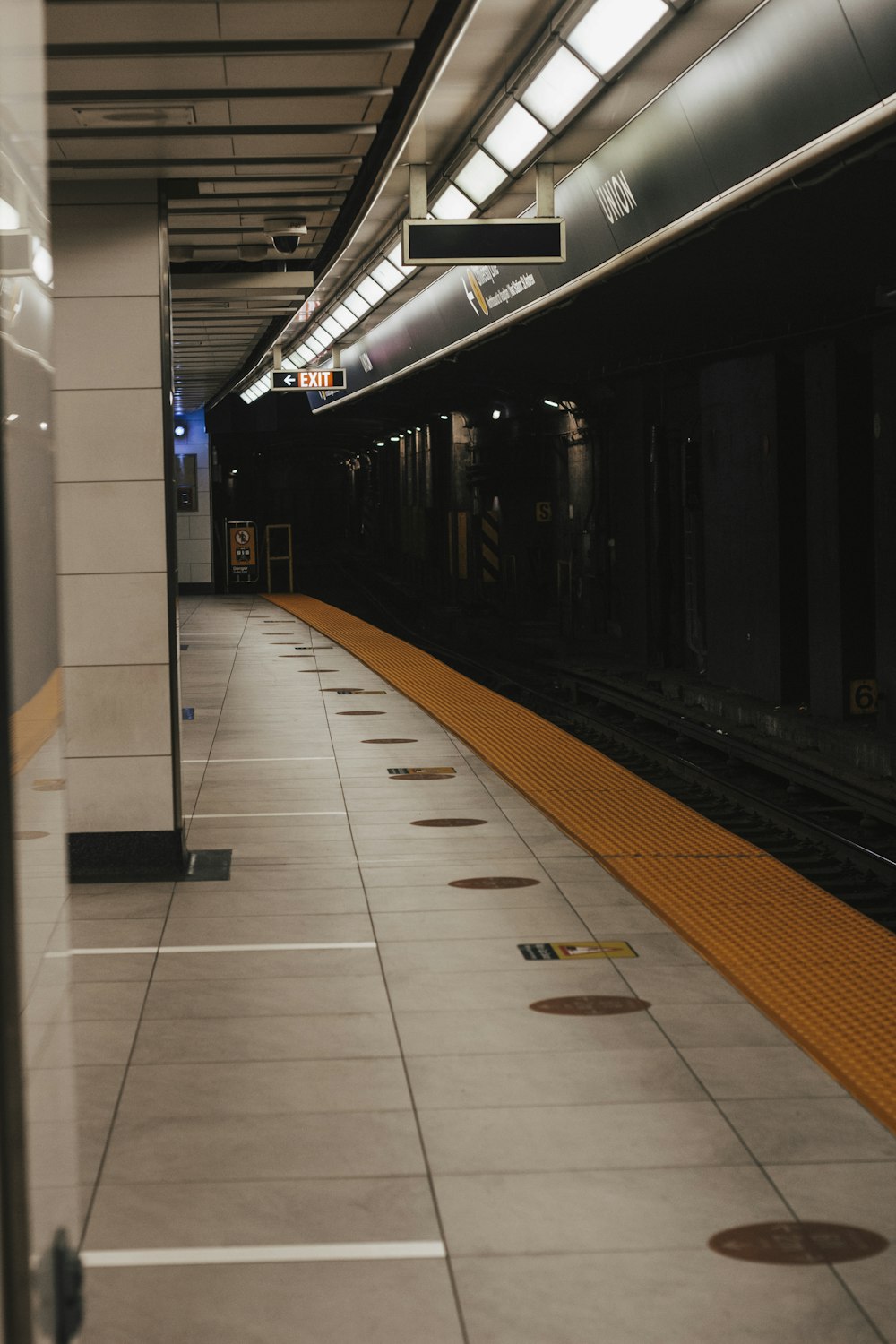 black and white train station