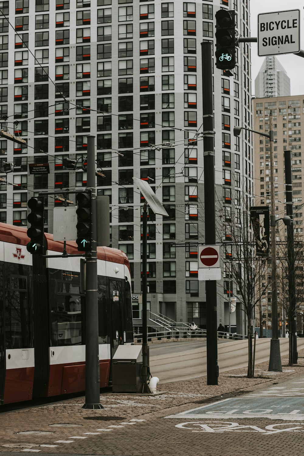 red and white train on the street