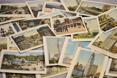 A collage of famous international landmarks like the Eiffel Tower and Machu Picchu.