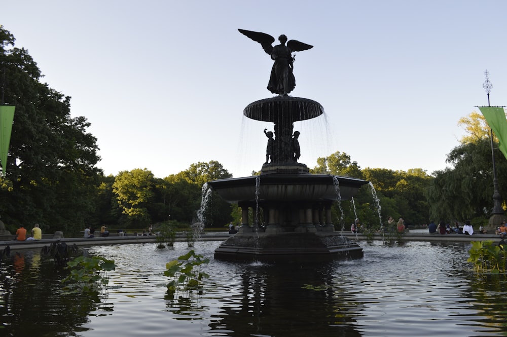 black statue on water fountain