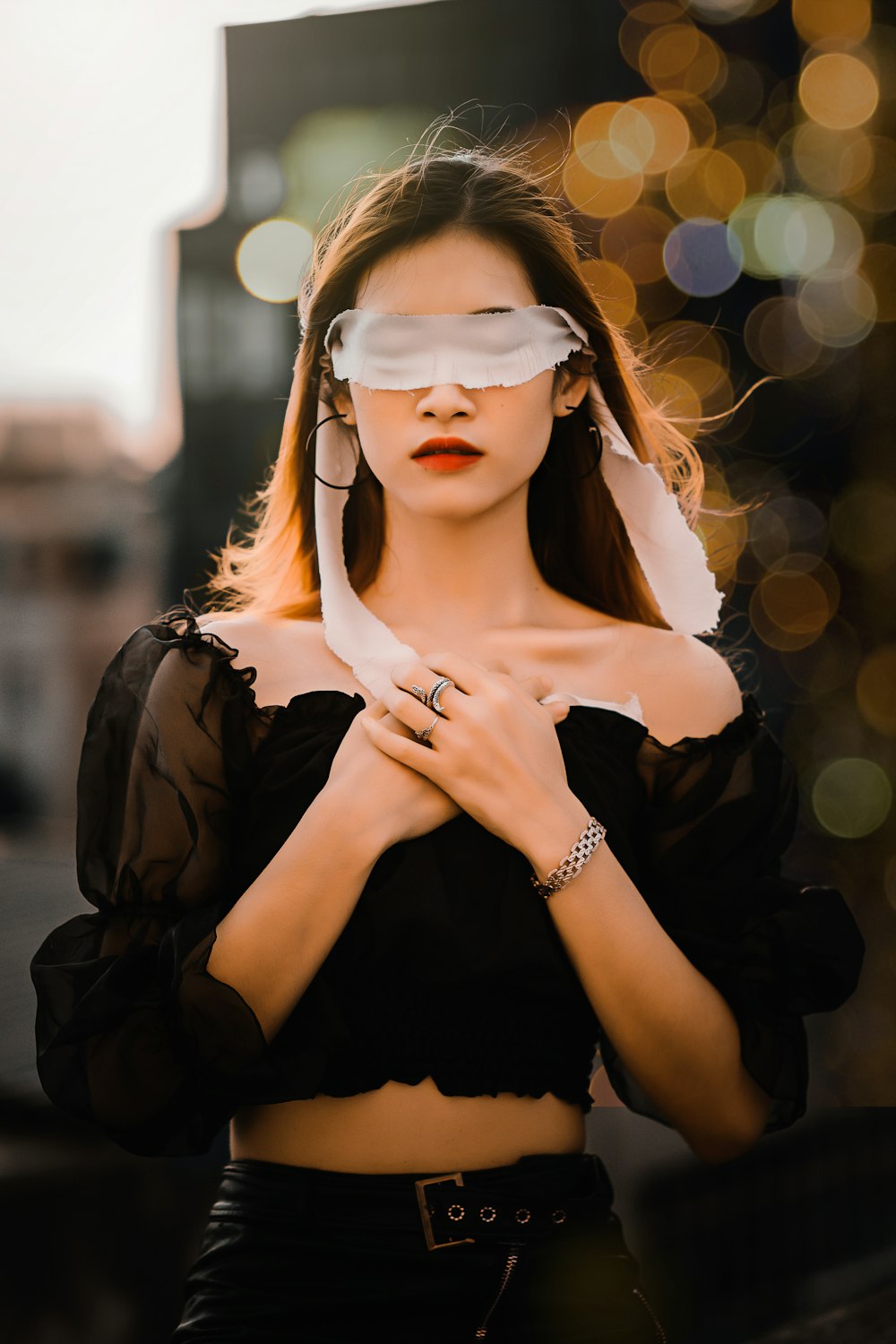 woman in black long sleeve shirt wearing white sunglasses