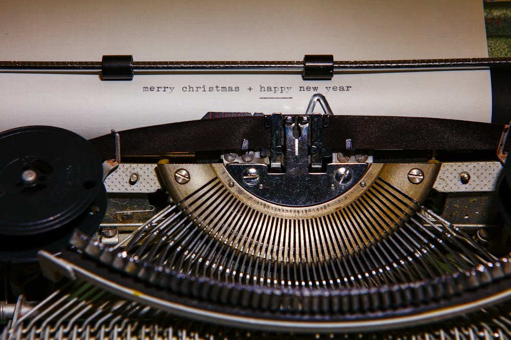 black and white typewriter on white table