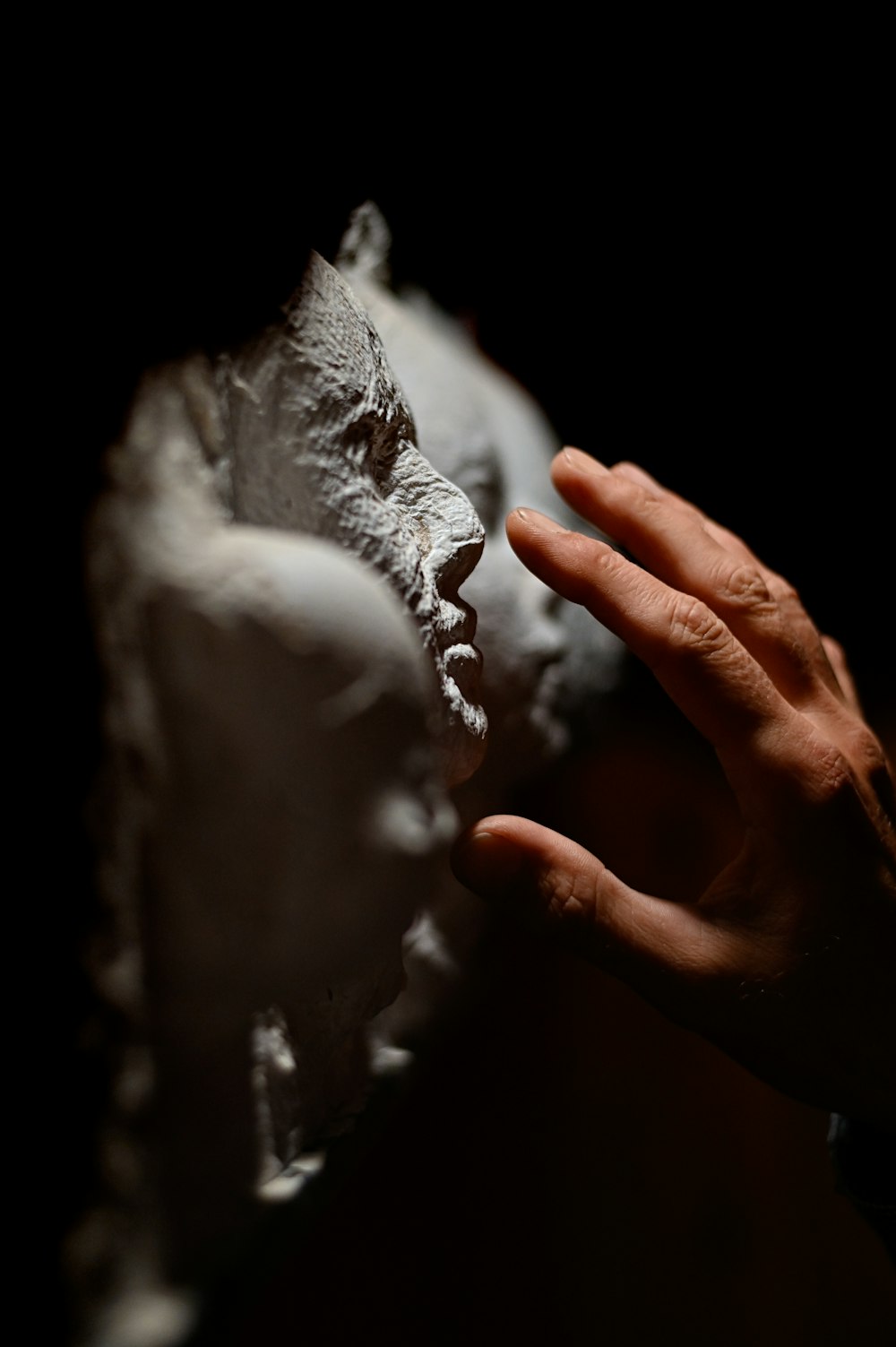 persons hand with white powder