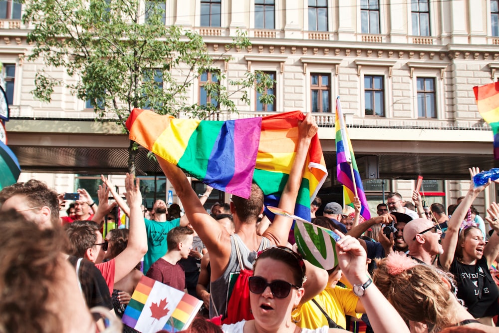 people gathering near building during daytime