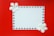 A white rectangular card is adorned with a border of small heart-shaped gems. Two white flowers are positioned at the top left and bottom right corners, providing a delicate touch against a vibrant red background.
