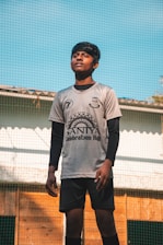 A focused teen athlete practicing mental toughness drills outdoors.